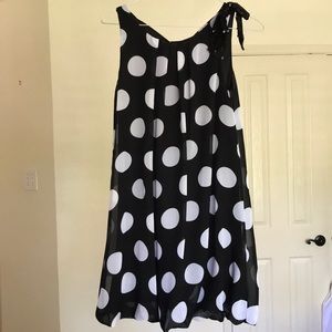 Justice sleeveless black polka dot dress